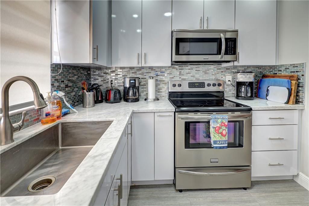 Photo of 600 Pine Dr #308, Pompano Beach, FL 33060 (MLS # F10255891)