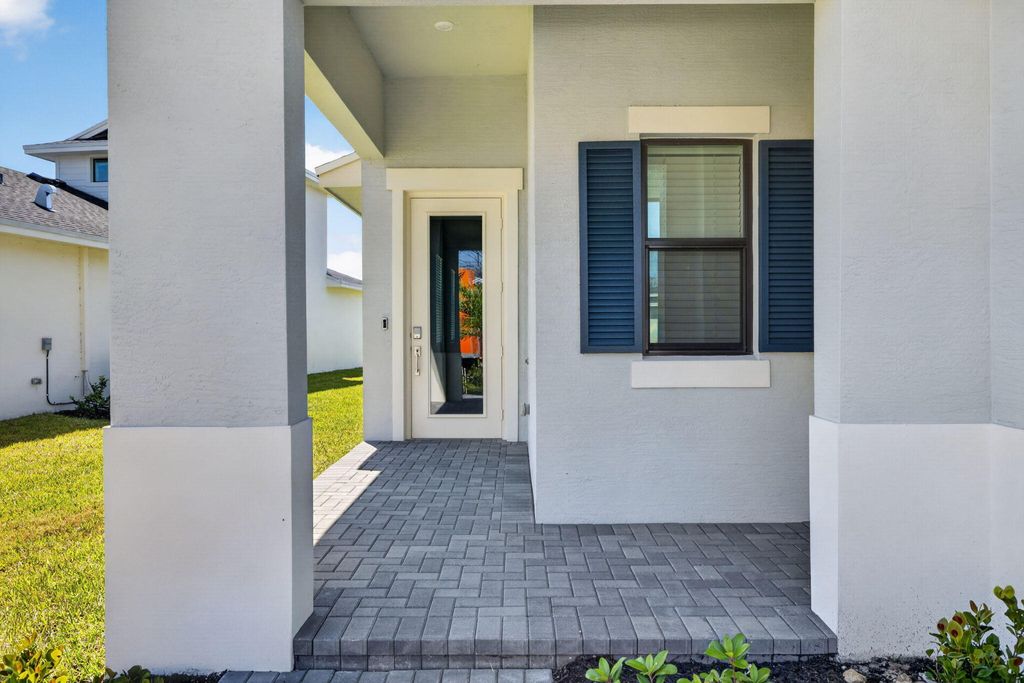 Photo of 10644 NW Wilgrove Lane, Port Saint Lucie, FL 34987 (MLS # B26034841)