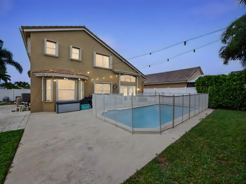 Tiny photo for 5053 Prairie Dunes Village Circle, Lake Worth, FL 33463 (MLS # B26010925)
