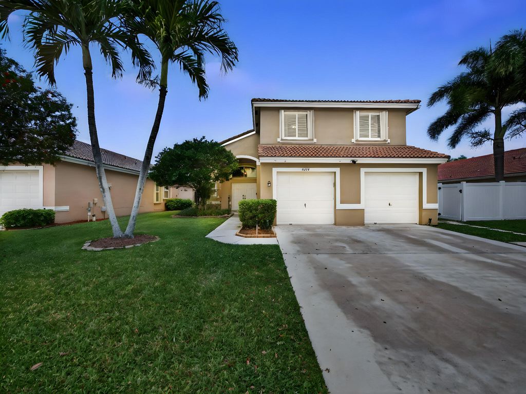 Photo of 5053 Prairie Dunes Village Circle, Lake Worth, FL 33463 (MLS # B26010925)