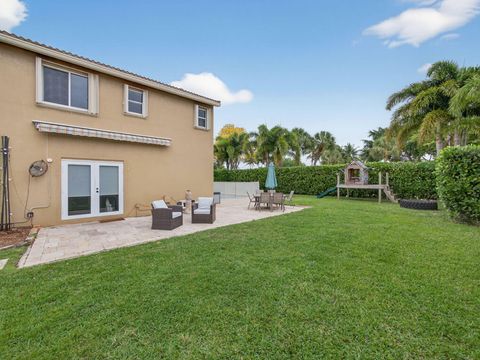 Tiny photo for 5053 Prairie Dunes Village Circle, Lake Worth, FL 33463 (MLS # B26010925)