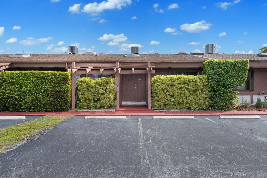 Spacious and beautifully maintained 2-bedroom, 2-bath villa offering 1,688 sq ft of living space with a desirable split floor plan. Enjoy your own private yard and atrium, perfect for relaxing or entertaining. Conveniently located just minutes from major shopping centers including Walmart, Publix, Walgreens, CVS, and more. Only 20 minutes to Fort Lauderdale Airport and a quick 5-minute drive to the beach and Three Island Kids Park. This home features two dedicated parking spaces right at your doorstep, a brand new refrigerator, and in-unit washer and dryer for your convenience. The community offers resort-style amenities including a swimming pool, tennis court, and sauna. Cable and internet are included in the maintenance fee. Leasing is permitted in the first year. Easy to show