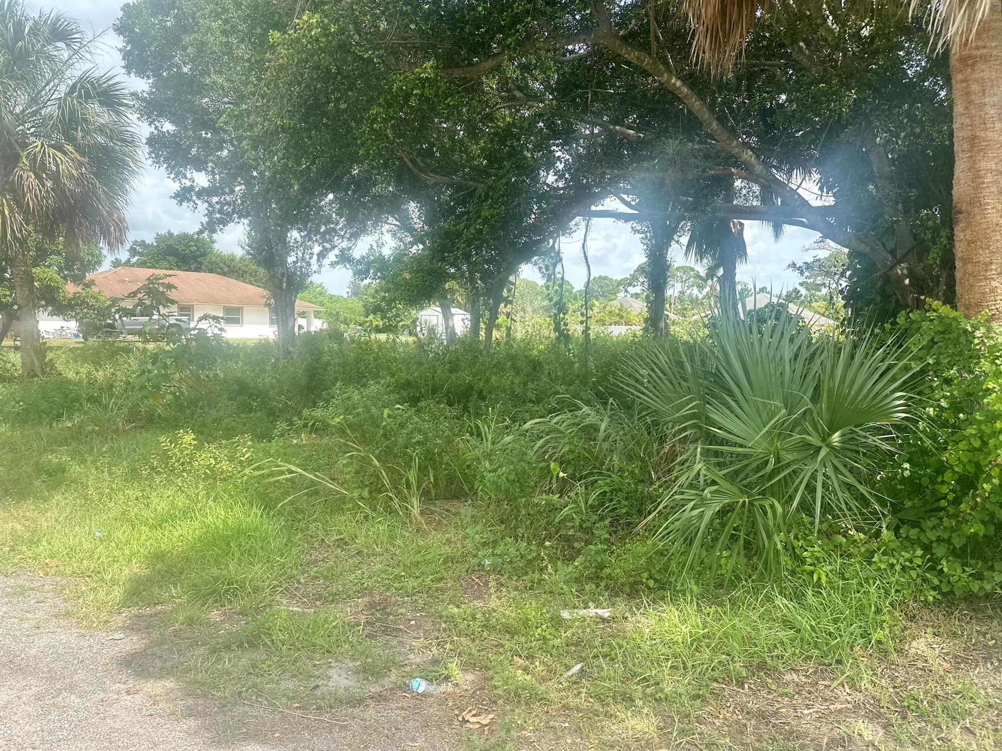 A RARE OPPORTUNITY EAST OF I-95! A prime piece of land in the heart of Jupiter, situated on a tranquil street -- Lush vacant land on a double lot. Ready for a show home to be built. There are a couple of large trees on the land, but basically flat and cleared, with public water and sewer.Close proximity to vibrant shops, world class restaurants, beautiful beaches and prestigious golf courses. Ideal location to build your dream home! Over 14,000 sq ft lot! Hurry! Call today!