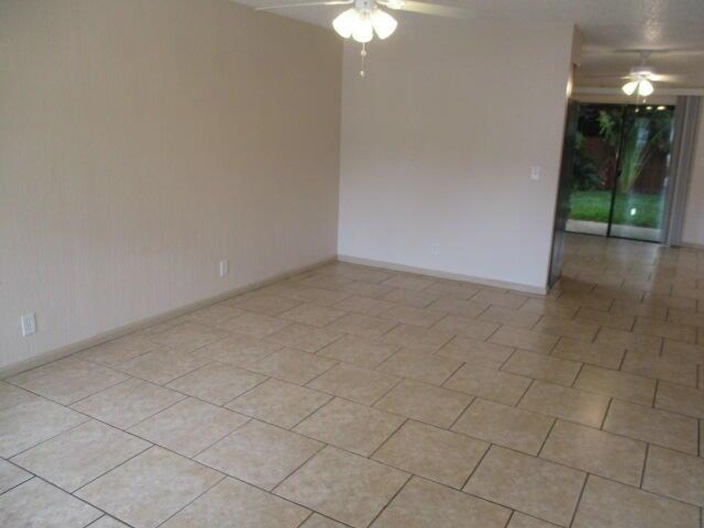 Photo of 9077 E Highland Pines Drive #9077, Palm Beach Gardens, FL 33418 (MLS # R11026563)