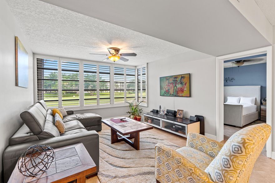 Welcome to this beautifully maintained first-floor condo in the desirable Whitehall at Pine Island community of Davie.  Step inside to find a bright and open layout featuring a generously sized living and dining area. The kitchen offers ample cabinetry and workspace, with easy flow into the main living space. One of the standout features of this home is the oversized laundry room—large enough for full-size washer and dryer plus extra storage and extra sleeping area or office space. Residents of Whitehall at Pine Island enjoy access to a clubhouse, pool, 18 hole Golf Course and maintained grounds. Conveniently located near shopping, dining, parks, and major highways, this property offers easy access to everything Davie has to offer, including nearby Nova Southeastern University.