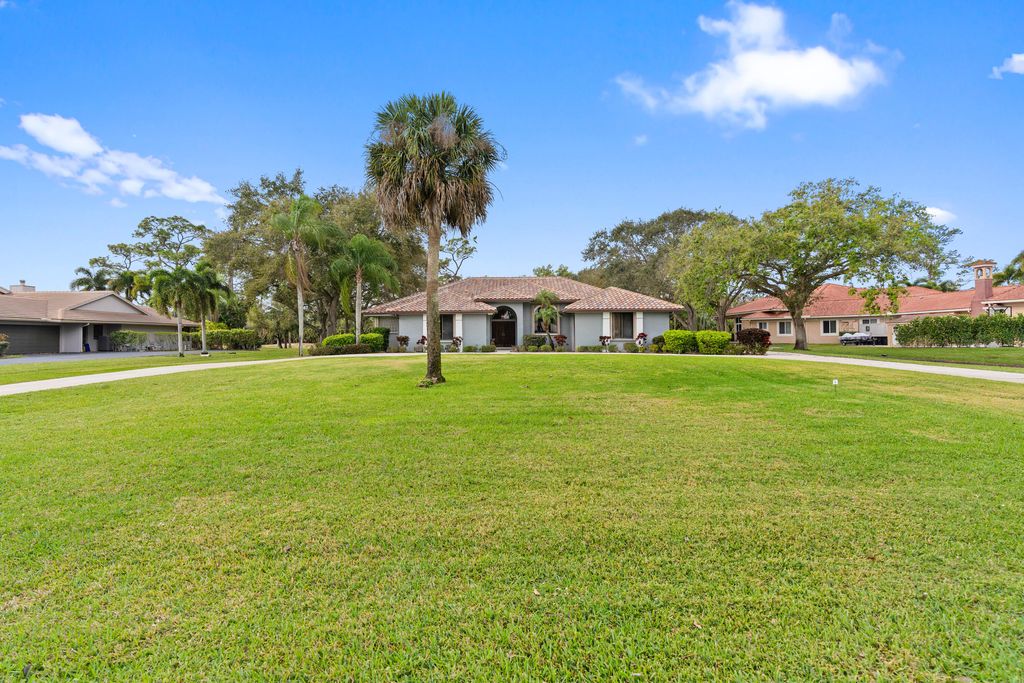 Photo of 9425 Dundee Drive, Lake Worth, FL 33467 (MLS # R11169065)