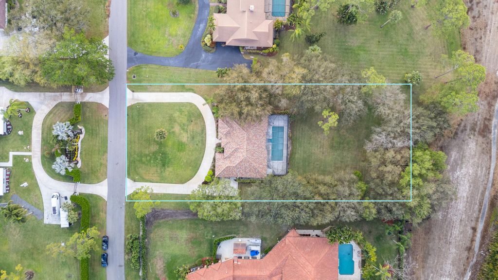 Photo of 9425 Dundee Drive, Lake Worth, FL 33467 (MLS # R11169065)