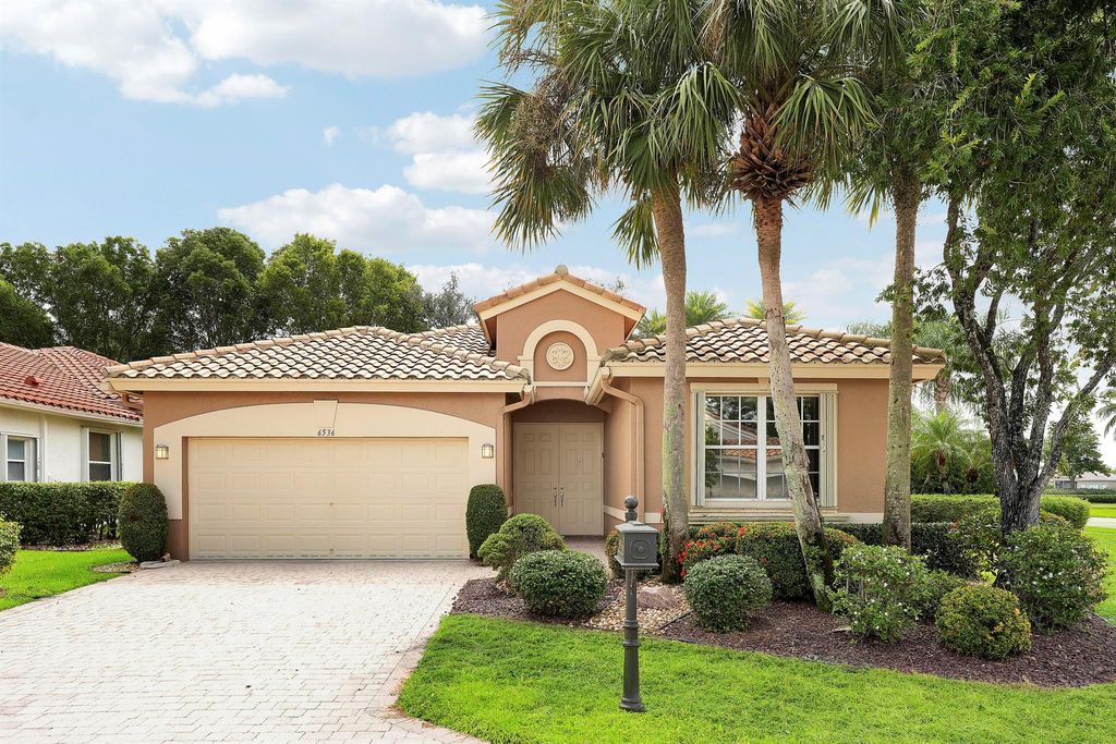 Photo of 6536 Pavone Street, Lake Worth, FL 33467 (MLS # R11120030)