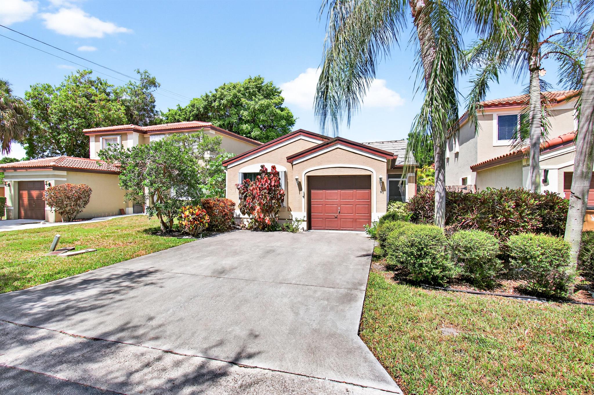 Beautifully Updated 3 Bedroom, 2 Bath Home in a Quiet Gated Community! Step into this move-in ready home featuring elegant marble floors throughout the main living areas and rich wood flooring in all bedrooms. The kitchen and bathrooms have been tastefully updated, offering modern finishes and added value.Enjoy your private covered patio and spacious backyard, perfect for relaxing or entertaining. Located in a quiet, gated community with great amenities including a community pool and children's playground. To top it all off--a brand new roof is being installed, adding peace of mind and even more value! This is the one you've been waiting for--schedule your private showing today!
