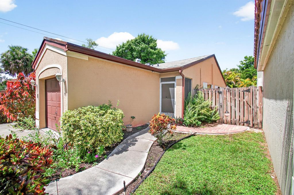 Photo of 19 NW 44th Terrace, Deerfield Beach, FL 33442 (MLS # R11117132)