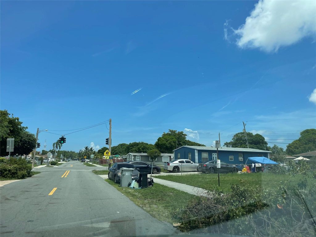 Photo of 1589 NW 6th Avenue, Pompano Beach, FL 33060 (MLS # F10556317)