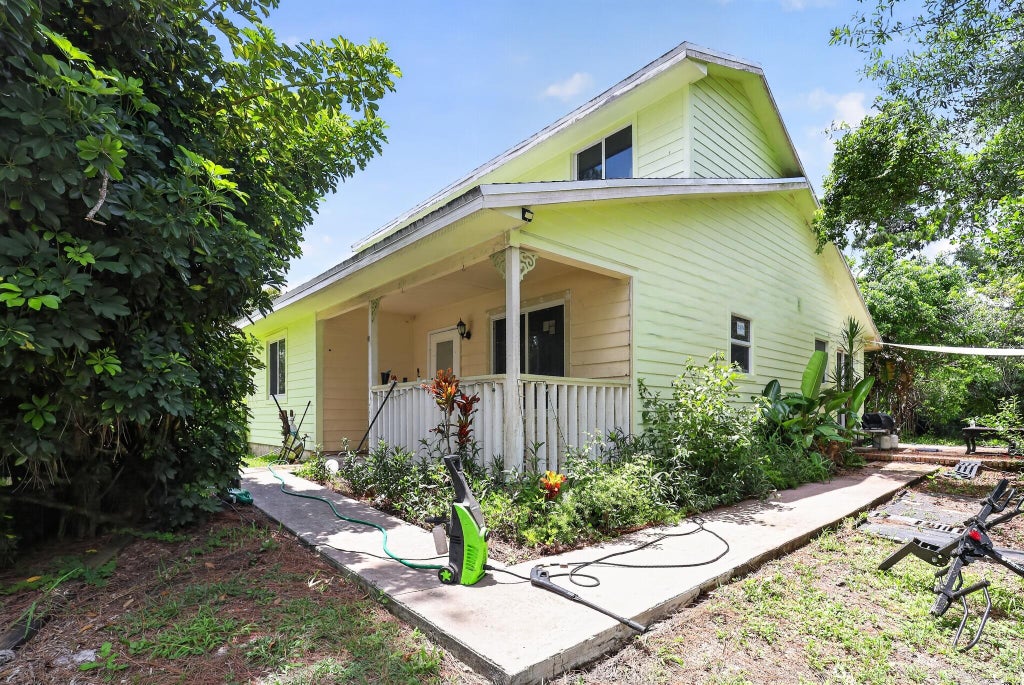 Photo of 16393 E Mayfair Drive E, The Acreage, FL 33470 (MLS # B26046523)