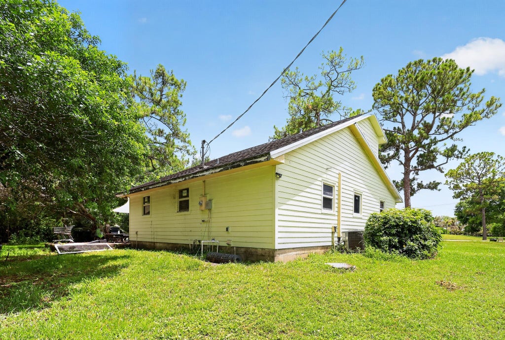 Photo of 16393 E Mayfair Drive E, The Acreage, FL 33470 (MLS # B26046523)