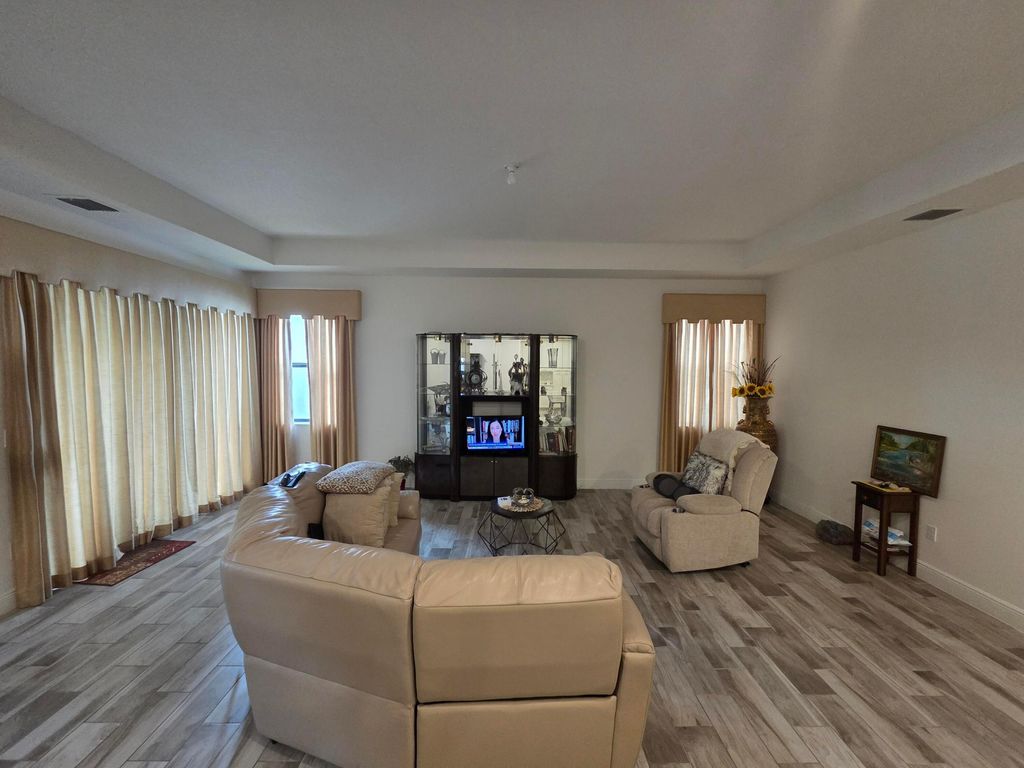 Photo of 7522 MOONRISE Drive, Lake Worth, FL 33467 (MLS # B26052171)