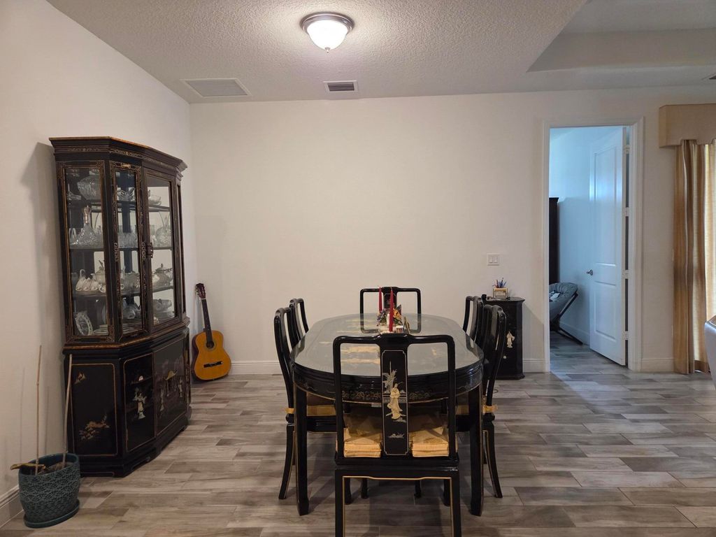Photo of 7522 MOONRISE Drive, Lake Worth, FL 33467 (MLS # B26052171)