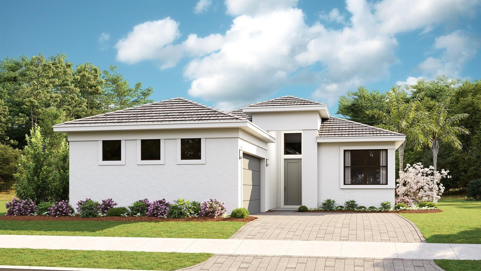 **New Construction** Move-in-ready available. This brand-new Lila floorplan is situated on a private homesite overlooking the Atlantic Ridge State Park. Within the gated community of Cove Royale and built by Kolter Homes, this Lila offers 3 bedrooms, 3 bathrooms, a flex room, and a 2-car garage. This Lila also has a 4' extension added to the primary bedroom and lanai. A 16-foot wide by 10-foot high sliding glass door overlooks the lanai and the state park, and the lanai has an added 5' privacy wall with gas, electric and water connections for a future outdoor summer kitchen. The house includes spray foam insulation, a tankless gas water heater and a gas connection for a future pool heater or generator.