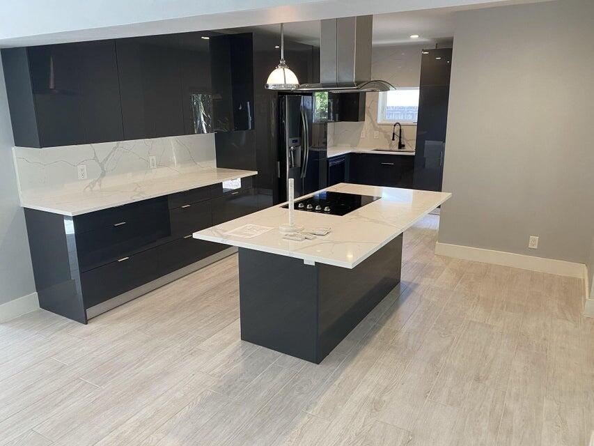 Photo of 418 SW 7th Terrace, Boca Raton, FL 33486 (MLS # R11101814)