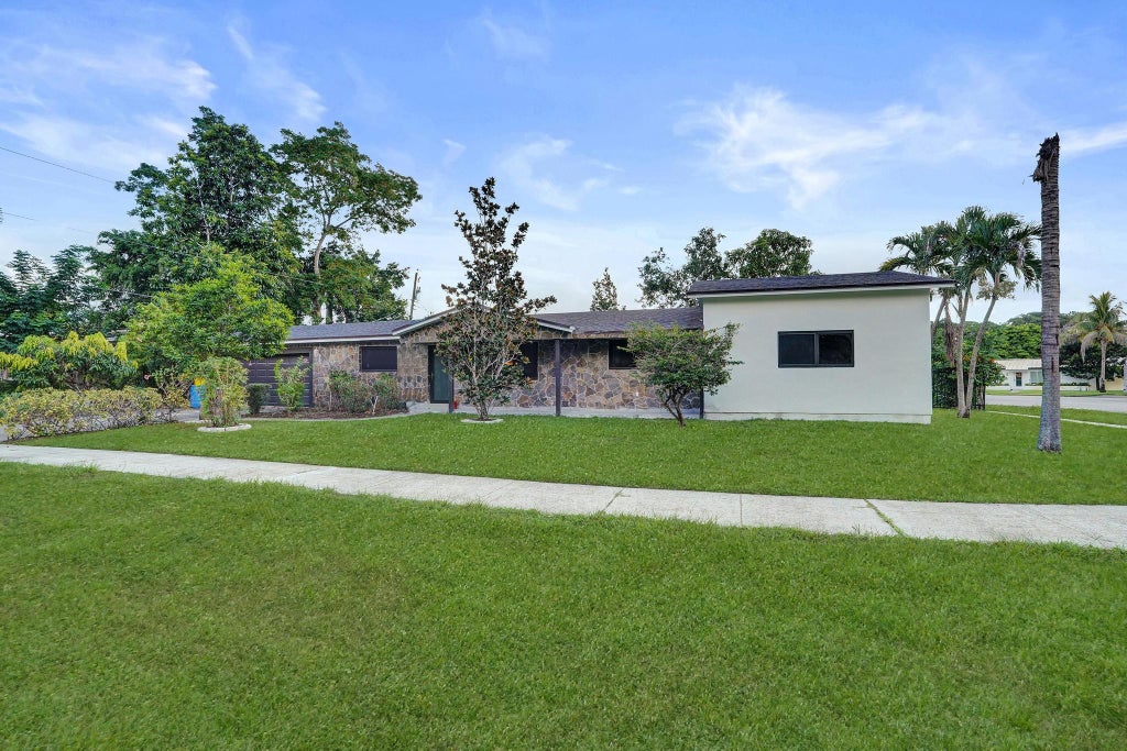 Photo of 393 CYPRESS Avenue, West Palm Beach, FL 33415 (MLS # B26092194)
