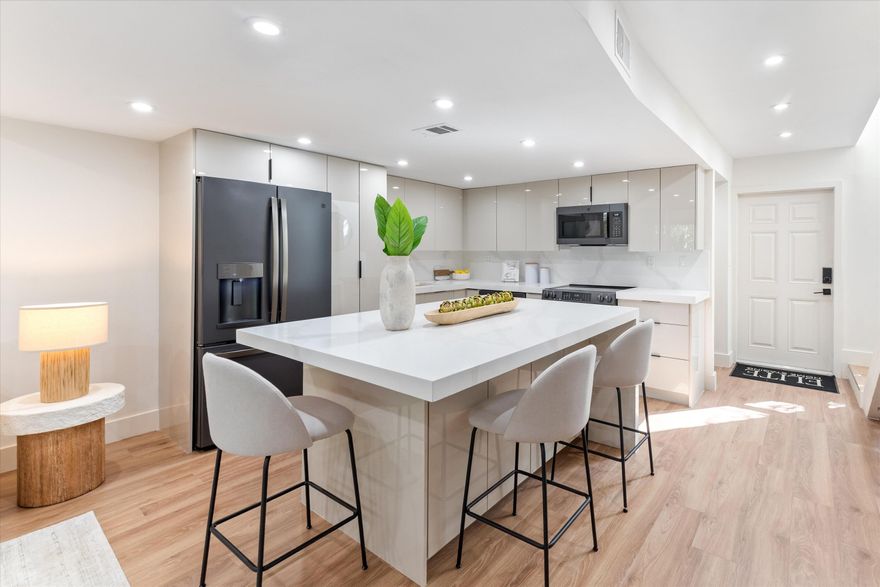 WOW! This is an impeccably maintained, gorgeous, stylish 2-bed, 2-bath spacious townhouse that is steps from the iconic Wilton Drive — with its amazing restaurants, shops, and vibrant nightlife. This home offers clean, modern, design from top to bottom. Close to the beautiful Las Olas Boulevard, world-class beaches, and everything South Florida has to offer. Enjoy a huge backyard area for the 4 legged family members, private sanctuary-like pool and entertainment area, and tranquility in this large corner unit townhome. This home is perfect for the pickiest buyer looking for perfection - come and see for yourself!