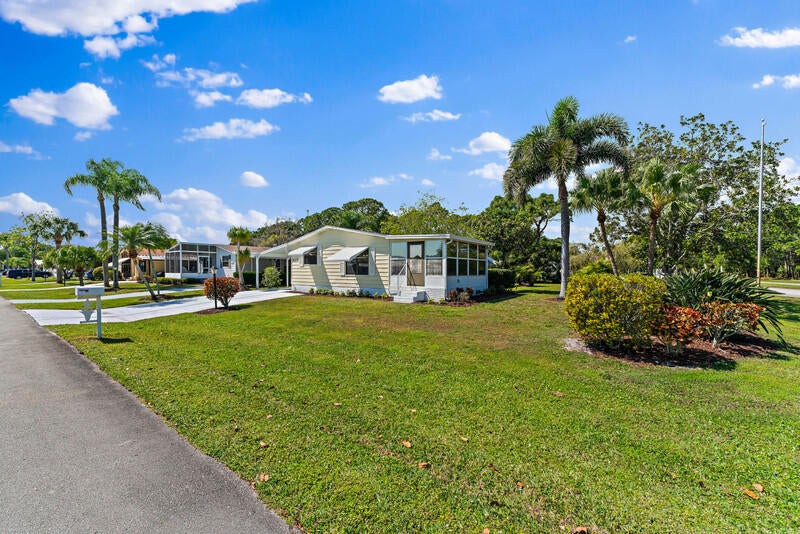 Photo of 8201 W Bitterbush Lane, Port Saint Lucie, FL 34952 (MLS # R10969076)
