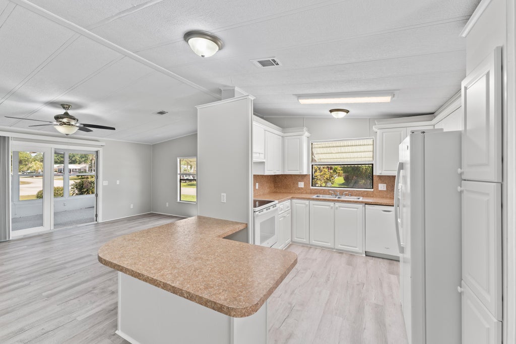 Photo of 8201 W Bitterbush Lane, Port Saint Lucie, FL 34952 (MLS # R10969076)