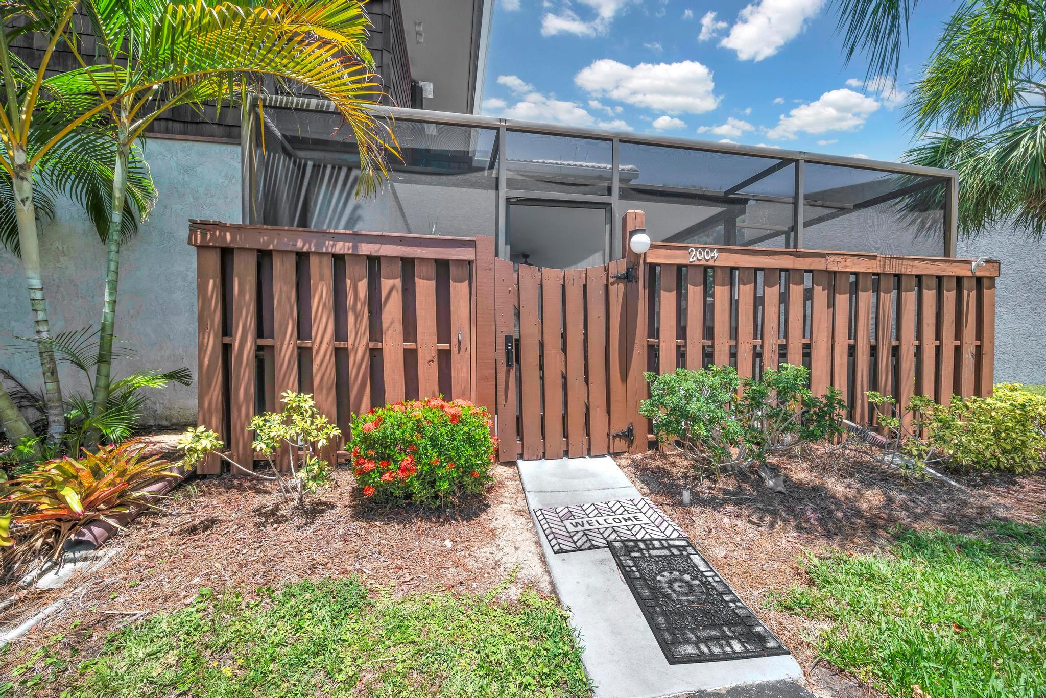 Beautifully remodeled 2BR/2.5BA townhome in desirable Camelot Gardens! Prime location just 3 minutes to US-1 with quick access to dining, shopping, hospitals & more. Features include updated kitchen with Corian countertops, glass tile backsplash, pull-out trash drawer, and new stainless-steel appliances. Brand new A/C & refrigerator. Updated flooring throughout, recessed lighting with dimmers, new fans, and new stairs. Master bathroom fully remodeled with granite counters. Enjoy the spacious patio--perfect for relaxing outdoors. Community amenities include pool, tennis, pickleball, racquetball, shuffleboard, clubhouse with kitchen & library, security patrol, and cameras. HOA covers water, cable, trash, landscaping, roof & building insurance. Just steps from the clubhouse and pool