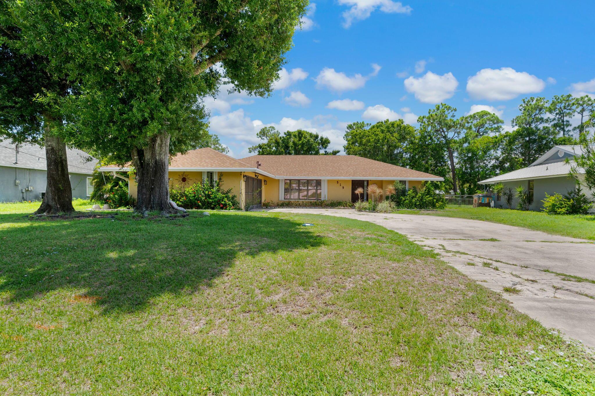Spacious ranch home with 3 bedrooms and 2 baths with 2 car garage. Large enclosed lanai overlooking back yard. Roof has been replaced in 2022, AC is new in 2019 and accordion shutters installed in 2021. Large open kitchen with family room, formal living room. Large primary bedroom with walk in closet. 2 additional bedrooms and bath.