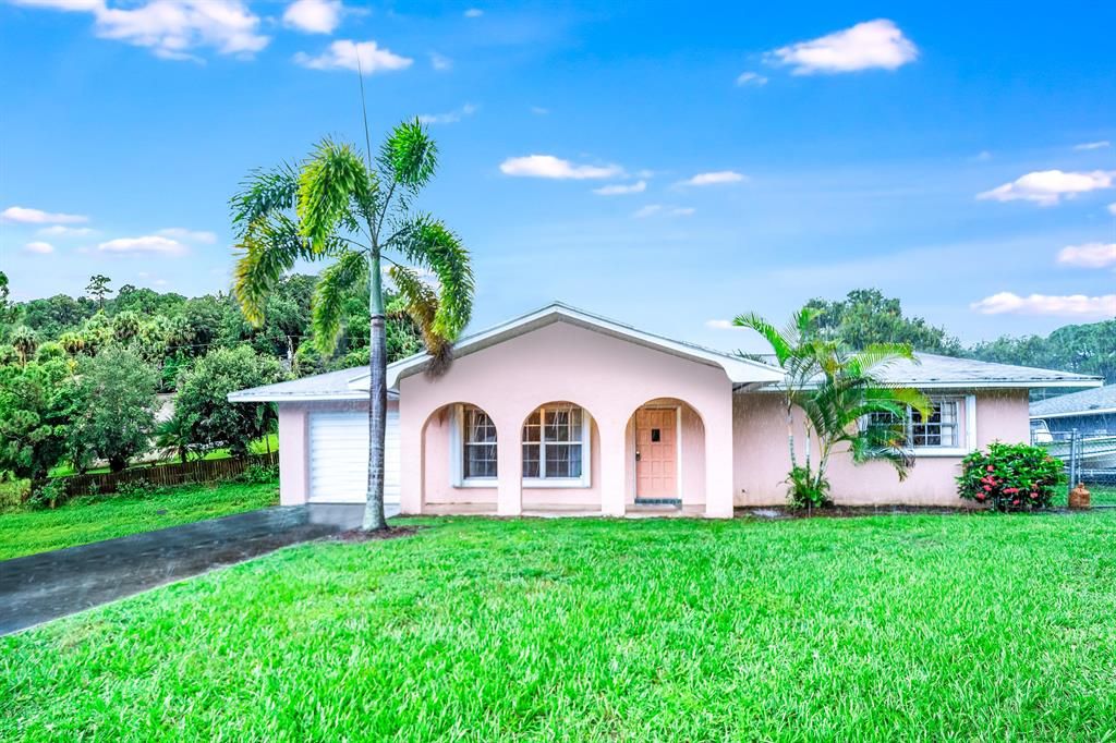 Photo of 7103 Fort Walton Avenue, Fort Pierce, FL 34951 (MLS # R10726500)