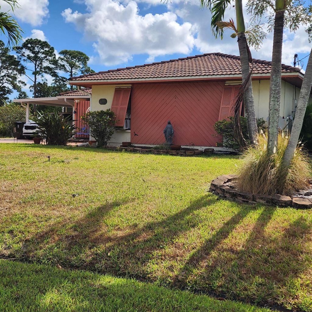 Photo of 2133 SW Kail Street, Port Saint Lucie, FL 34984 (MLS # R10984464)