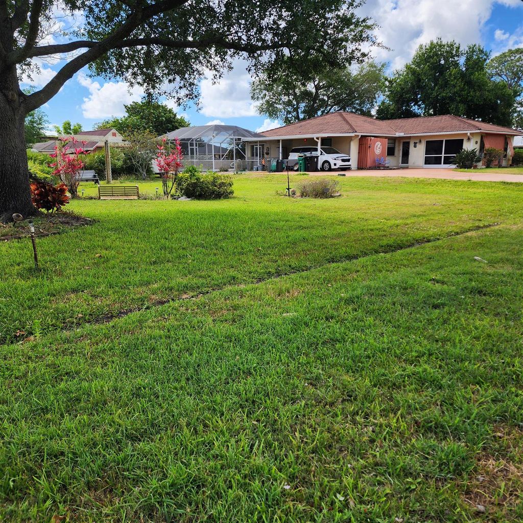 Photo of 2133 SW Kail Street, Port Saint Lucie, FL 34984 (MLS # R10984464)