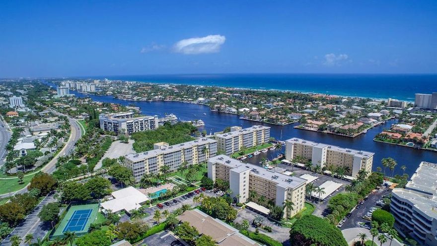 ONE OF THE MOST DESIRABLE VIEWS IN HARBOURSIDE. BEAUTIFULLY UPDATED 2/2 CONDO WITH LONG INTRACOASTAL VIEWS LOOKING SOUTH TOWARDS THE LINTON BRIDGE AND OVERLOOKING THE MARINA.  ELECTRIC ROLL DOWN HURRICANE SHUTTERS. WALK RIGHT OUT YOUR COVERED PATIO TO YOUR BOAT AND MARINA. WASHER/DRYER IN UNIT AND ADDITIONAL STORAGE AVAIALABLE. Low HOA's,harbor boat slips available at $1.00 per foot. Less than 1 mile to the beach. Short walk, bike or Downtowner ride to trendy Atlantic Avenue. Recently remodeled, first floor unit with high quality construction throughout, beautiful interior in highly sought after Harbourside complex of Delray Beach.