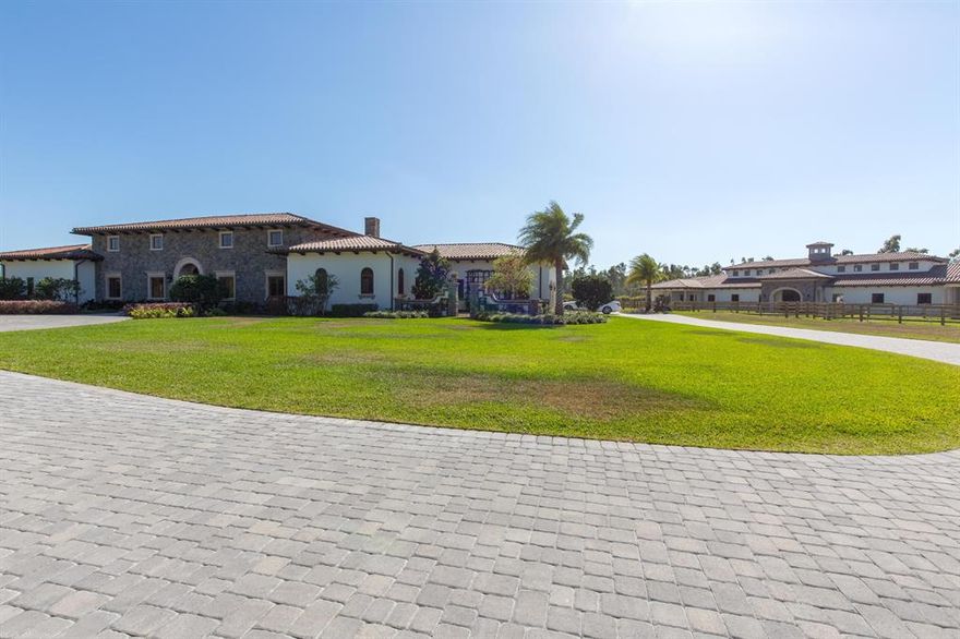 Never been lived in new construction!! This 5.5 acre equestrian estate has a private, cul-de-sac location in the exclusive gated community of Palm Beach Point. The grand main house is a 5BR, 6BA masterpiece, complete with smart home technology and extravagant outdoor living spaces, including an infinity pool and spa. The first class equestrian facility was designed by a renowned equestrian and includes a large all-weather riding arena and many paddocks. The magnificent 14 stall show barn has soaring ceilings, a gorgeous tack room, custom feed rooms and full grooms quarters. Adjacent property also available with 4 bedroom house and space for additional equestrian features.