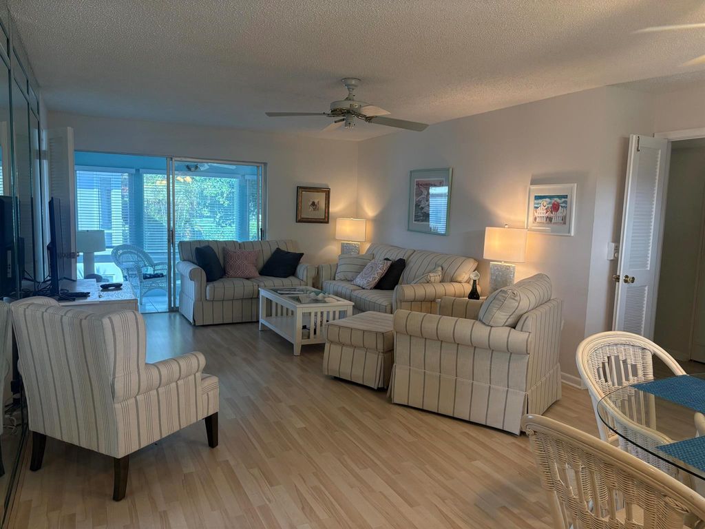 Photo of 27 Colonial Club Drive #200, Boynton Beach, FL 33435 (MLS # R11107417)