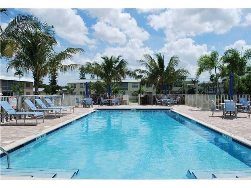 INCREDIBLE DEAL ON A FIRST FLOOR 2 BEDROOM 2 BATH. BEAUTIFUL FLOORS, FLORIDA ROOM,  EAT IN KITCHEN, SPLIT BEDROOM FLOOR PLAN & ENTRY FOYER. SHORT WALK TO CLUBHOUSE & BEAUTIFUL LARGE POOL, SPA & COVERED PATIO AREA. BEST DEAL IN TOWN. GAS BBQ GRILL AND PICNIC TABLES OVERLOOKING THE CANAL. Sandalfoot South One Condo Inc IS ONE OF THE VERY FEW COMMUNITIES THAT IS A SHORT WALK TO A COMPLETE SHOPPINGS CENTER. 2 BUS STATIONS UP FRONT Palm Beach County & Broward County on SW18th Street. COME CHECK THIS OUT SOON BY APPOINTMENT OR WHEN IT IS ON OPEN SCHEDULE. FAST CLOSING TO GET YOU OUT OF THE SNOW. Sandalfoot South One Condo Inc is all 2 story buildings & is an independant condominium. There is no master association. (Landlords need not apply. No annual rentals at all ever.) Shown By Appointment.
