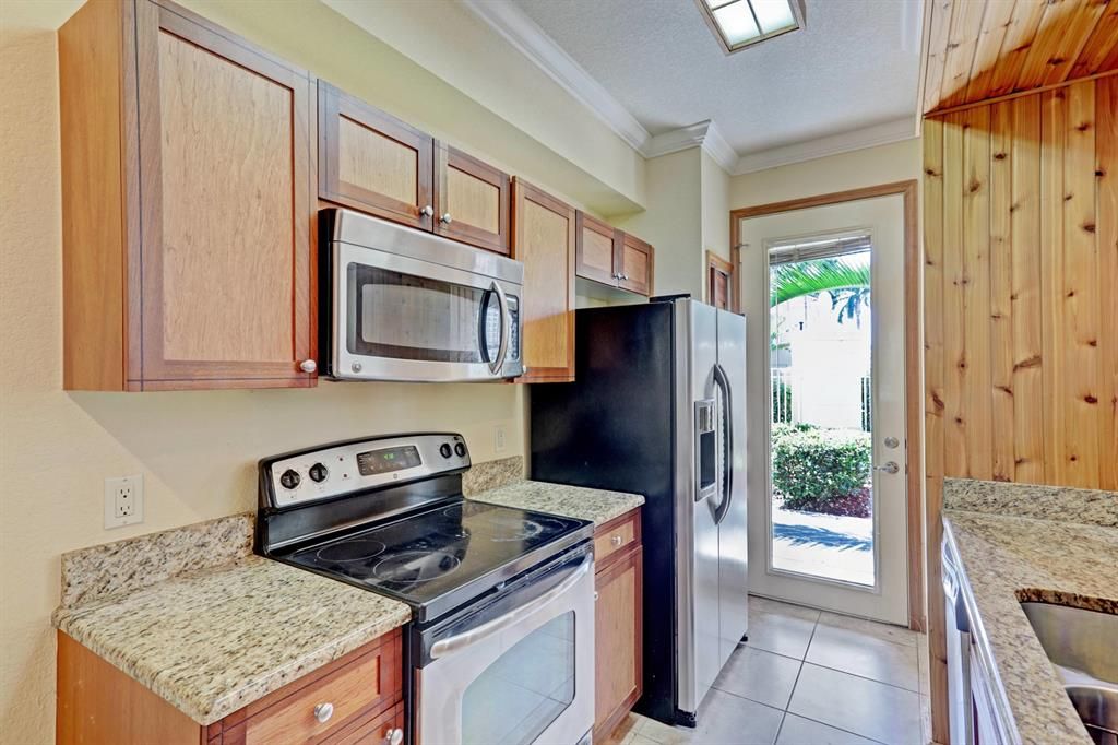 Photo of 11011 Legacy Lane #104, Palm Beach Gardens, FL 33410 (MLS # R10715236)