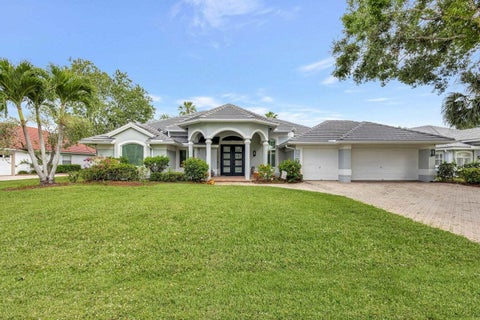 Photo of 2703 SW GLENMOOR Way, Palm City, FL 34990 (MLS # B26072537)