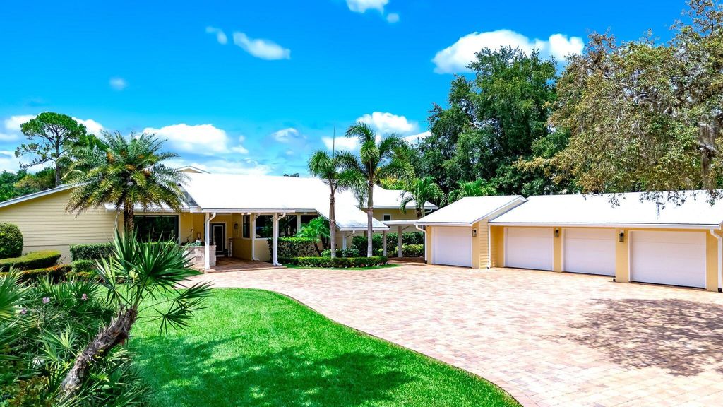 Photo of 1819 SW Crane Creek Ave, Palm City, FL 34990 (MLS # R11101644)