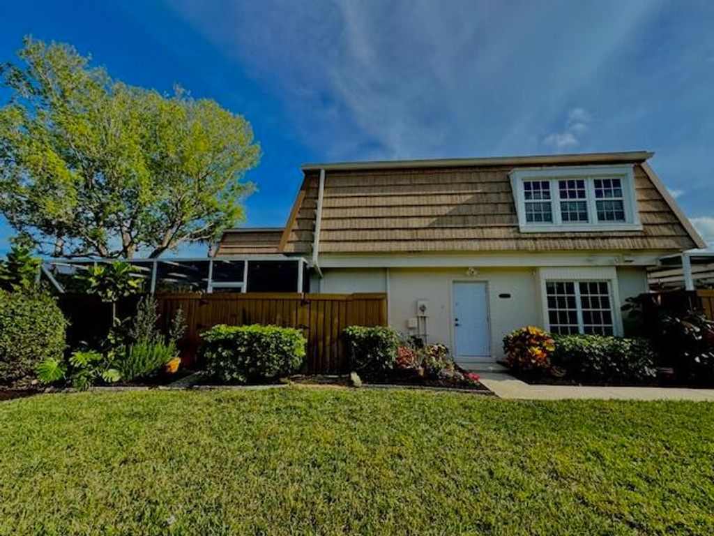 Photo of 11555 Winchester Drive, Palm Beach Gardens, FL 33410 (MLS # R10980036)