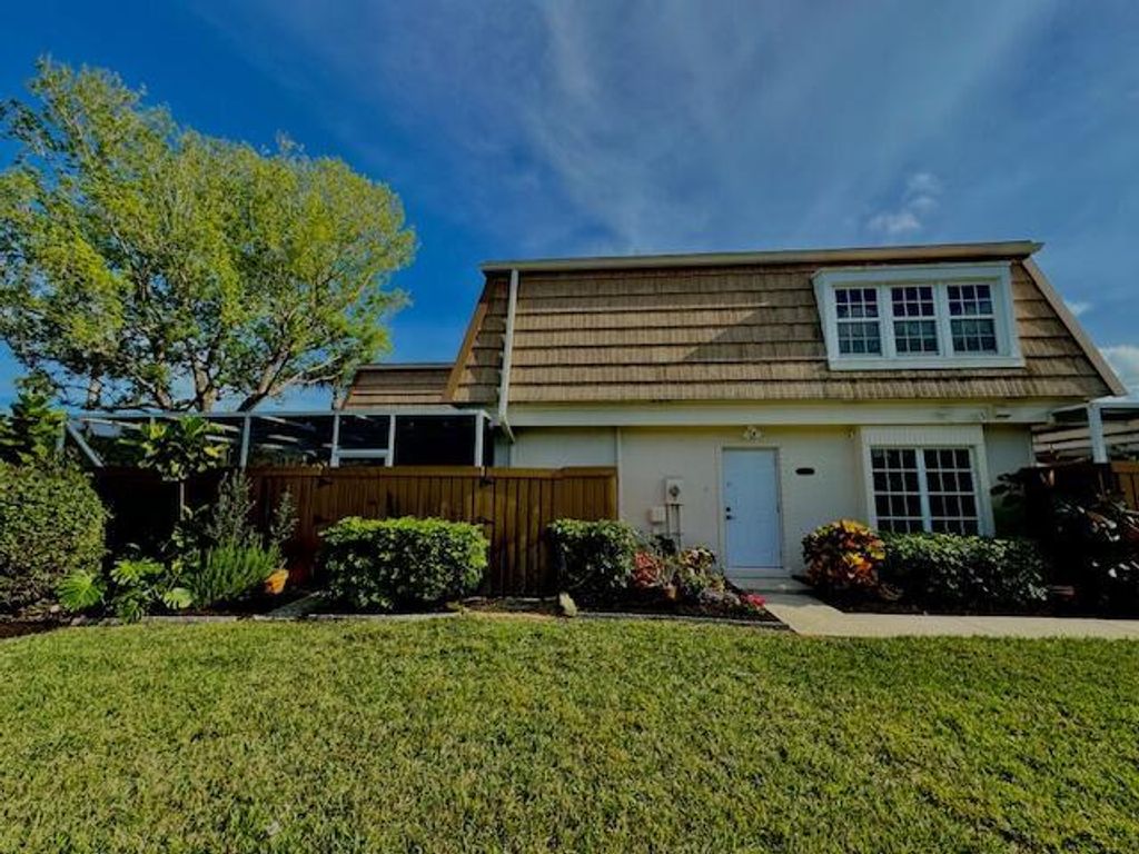 Photo of 11555 Winchester Drive, Palm Beach Gardens, FL 33410 (MLS # R10980036)