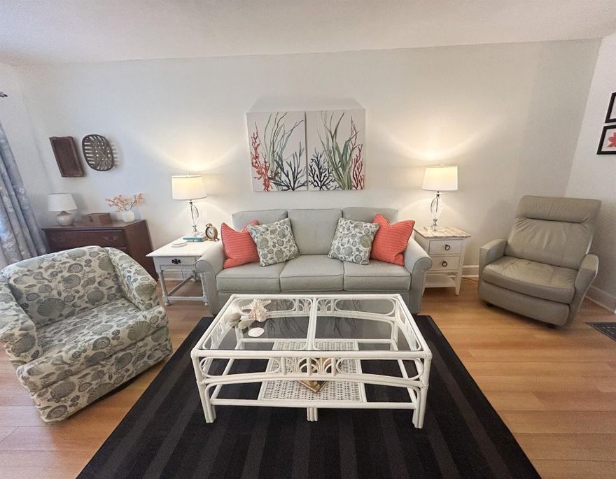 Corner unit that features the essence of Florida.  1 Bedroom 1and 1/2 Baths. Updated unit not only the kitchen with stainless steel appliances but also the bathrooms and flooring.  Conveniently located across the street from the clubhouse so you can enjoy all the amenities.  Pool, sauna, tennis, billiards, library, the list goes on and on.  If you are looking for a place to call home year round or you are a snow bird don't miss this unit.