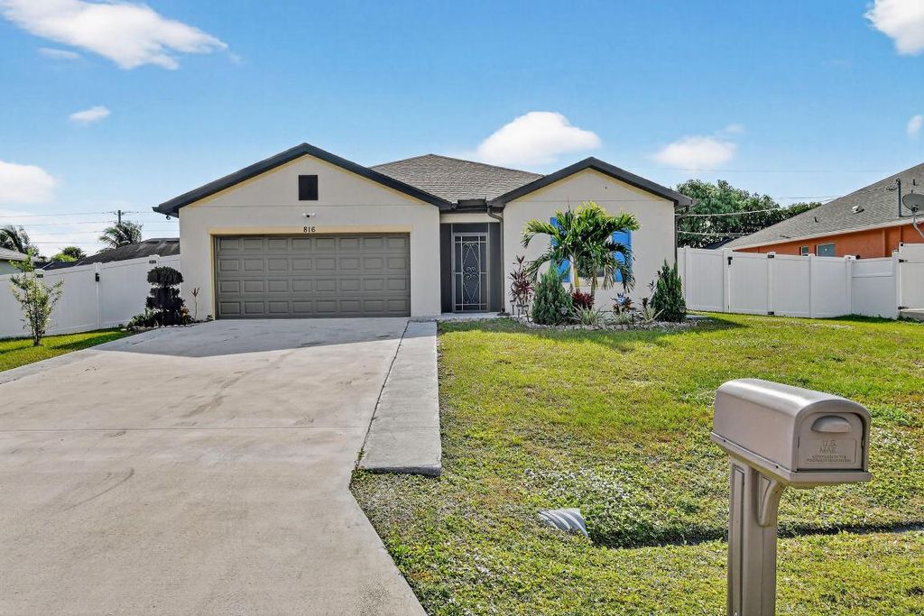 Photo of 816 SW Jaslo Avenue, Port Saint Lucie, FL 34953 (MLS # R11145058)