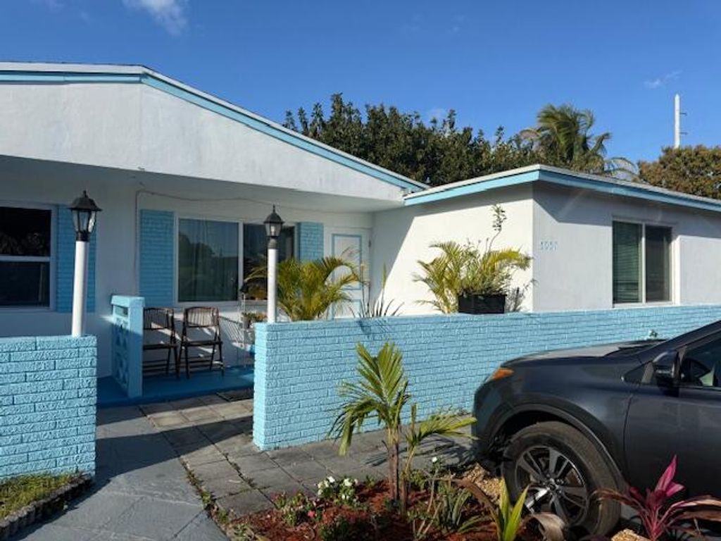 Photo of 5057 Eadie Place, West Palm Beach, FL 33407 (MLS # B26000791)