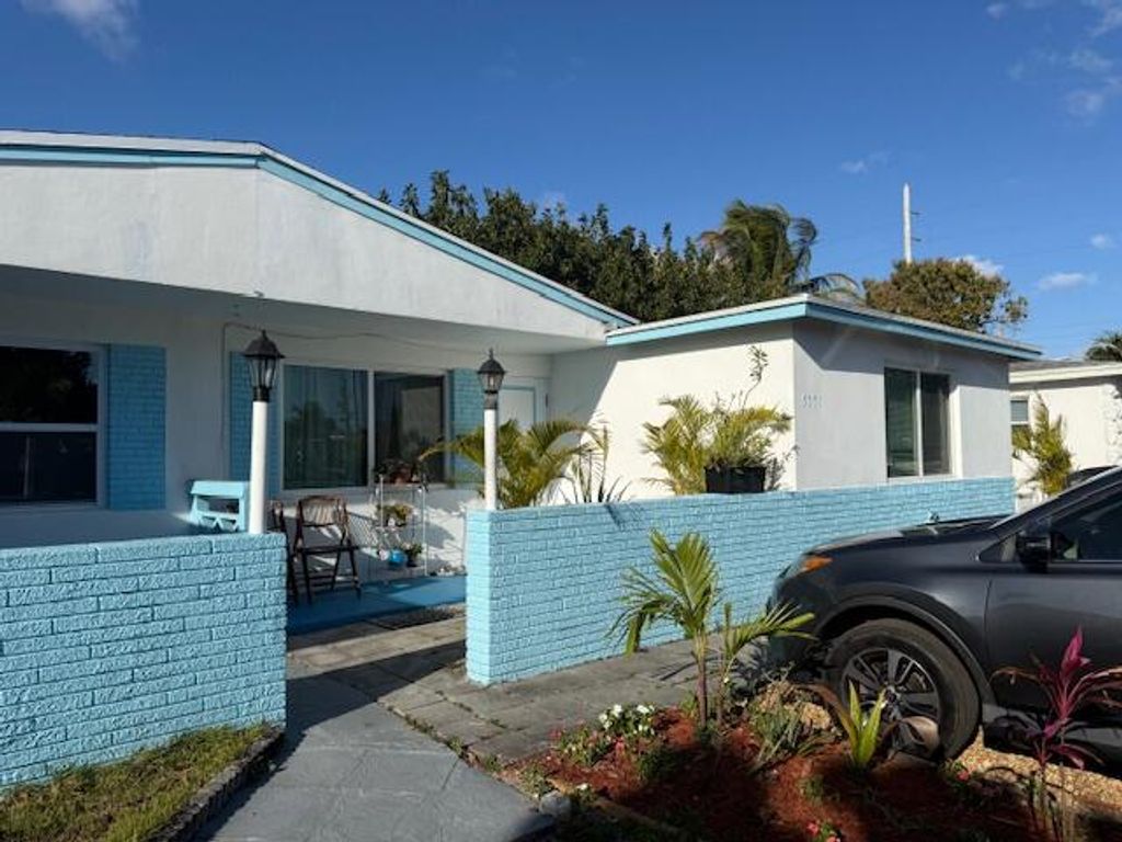 Photo of 5057 Eadie Place, West Palm Beach, FL 33407 (MLS # B26000791)