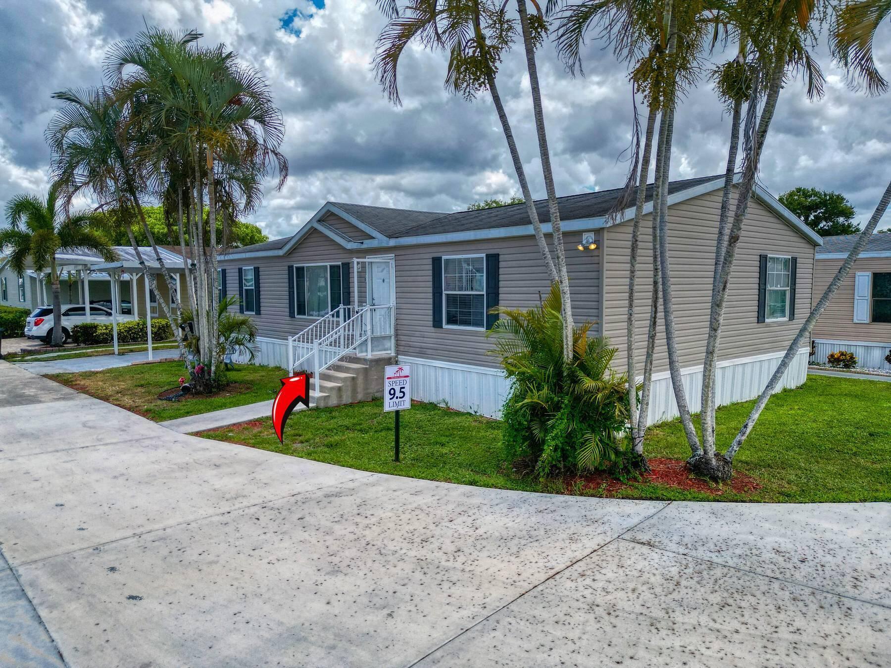 Just Listed!!Great price in Palm Beach County! Great location with plenty amenities. 3 bedrooms, 2 bathrooms, In-law efficiency. Modern refrigerator, Laundry room, laminated flooring. spacious carport. All age community with Clubhouse, pool, fitness, Ball Field, Basketball, tennis and much more. Beautiful lake for fishing. FINANCING AVAILABLE.