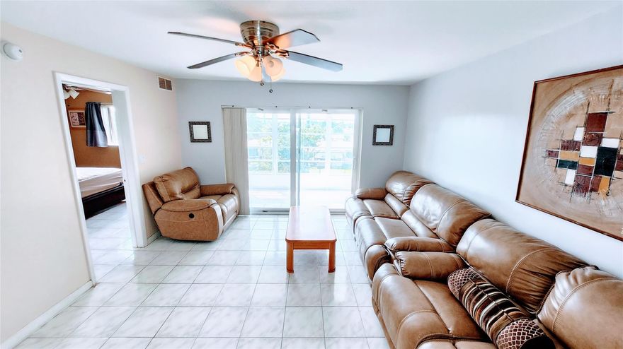 Welcome to peaceful living in Sunrise Lakes Phase 3—55+ HOPA verified. This top-floor 2-bed, 2-bath condo offers beautiful open-sky and lake views from your screened balcony. Enjoy the convenience of an assigned parking space right in front, a quiet, well-kept unit with tile floors throughout, marble countertops, and impact windows & door for safety. The community is vibrant with endless amenities: pools, clubhouse, gym, bingo nights, billiards & more! HOA is $647/month (plus $54 assessment) and includes water, internet, cable, and all facilities (electric not included). Easy access, vacant, and move-in ready!