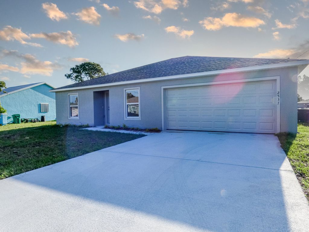 Photo of 2537 SE Richmond Street, Port Saint Lucie, FL 34952 (MLS # R10786575)