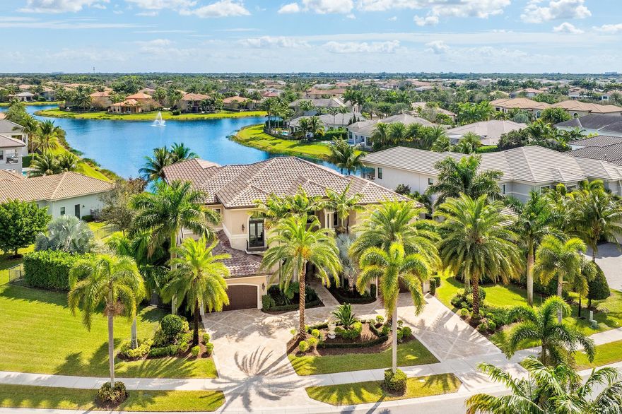 Discover the breathtaking 16598 Fleur De Lis Way, an extraordinary Palazzo model residence nestled within the prestigious enclave of Seven Bridges. Crafted in 2016, this exquisite property epitomizes refined luxury and offers unparalleled sophistication. 
 
Graced by its premier location, commanding views of a tranquil lake and a picturesque fountain, this exceptional property spans a total of 10,070 square feet, with an interior space of 7,757 square feet, set upon over half an acre of meticulously manicured land. Enter through grand double doors to be greeted by a palatial formal sitting area adorned with towering windows that frame the picturesque vistas, infusing the space with an ethereal allure. With six grand bedrooms and six and a half baths, including a lavishly appointed primary suite boasting a morning bar and bespoke custom closets, every corner of this estate exudes opulence.
 
Designed to indulge the most discerning culinary desires, the chef's kitchen is a masterpiece, featuring state-of-the-art Wolf and Sub-Zero appliances seamlessly integrated with two spacious walk-in pantries. From intimate gatherings to lavish soirées, this culinary haven is equipped to dazzle and delight.
 
Entertainment options include a sophisticated game room, a lavish full bar, and a private in-home theater system adorned with plush seating. Stay active in the private gym or retreat to the tranquility of the lushly appointed outdoor spaces, featuring a resort-inspired heated pool, gas-stone fire pits, and a gourmet summer kitchen, creating an ambiance of unparalleled luxury. Additional amenities include an elevator for seamless accessibility, electric shades for added comfort, a full-home natural gas generator, and a state-of-the-art security system with cameras. 
 
SEVEN BRIDGES:
 
Seven Bridges epitomizes luxury living with its resort-style community boasting a sprawling 33,000-square-foot clubhouse brimming with diverse amenities. Among its offerings are 13 tennis courts, a comprehensive fitness center, indoor and outdoor basketball courts, and an arcade for entertainment. The pool area is a haven with its splash pad, resort-style pool, and lap pool. Residents can enjoy card rooms, event spaces like the Grand Lounge, and outdoor pavilion within the clubhouse and indulge in culinary delights at the 5-star Prime 7 restaurant. Adding to the convenience is an on-site Starbucks, ensuring every comfort is within reach. Seven Bridges offers a pinnacle of luxurious living in South Florida.