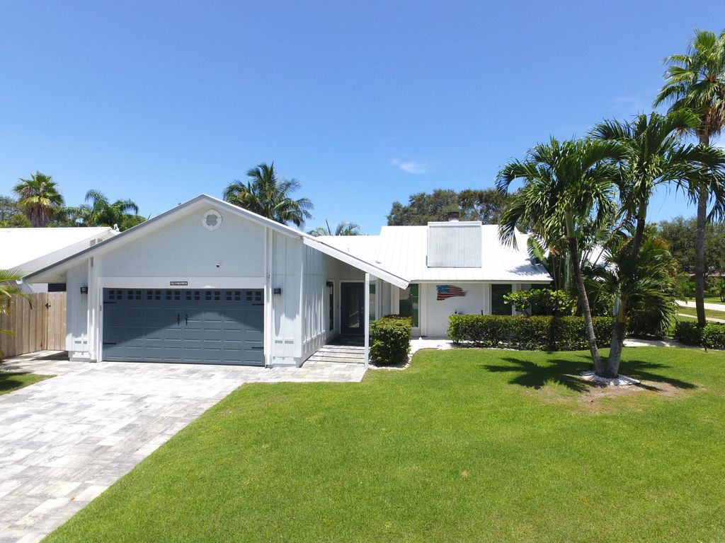 Photo of 19 Pine Hill Trail E, Tequesta, FL 33469 (MLS # R11022367)