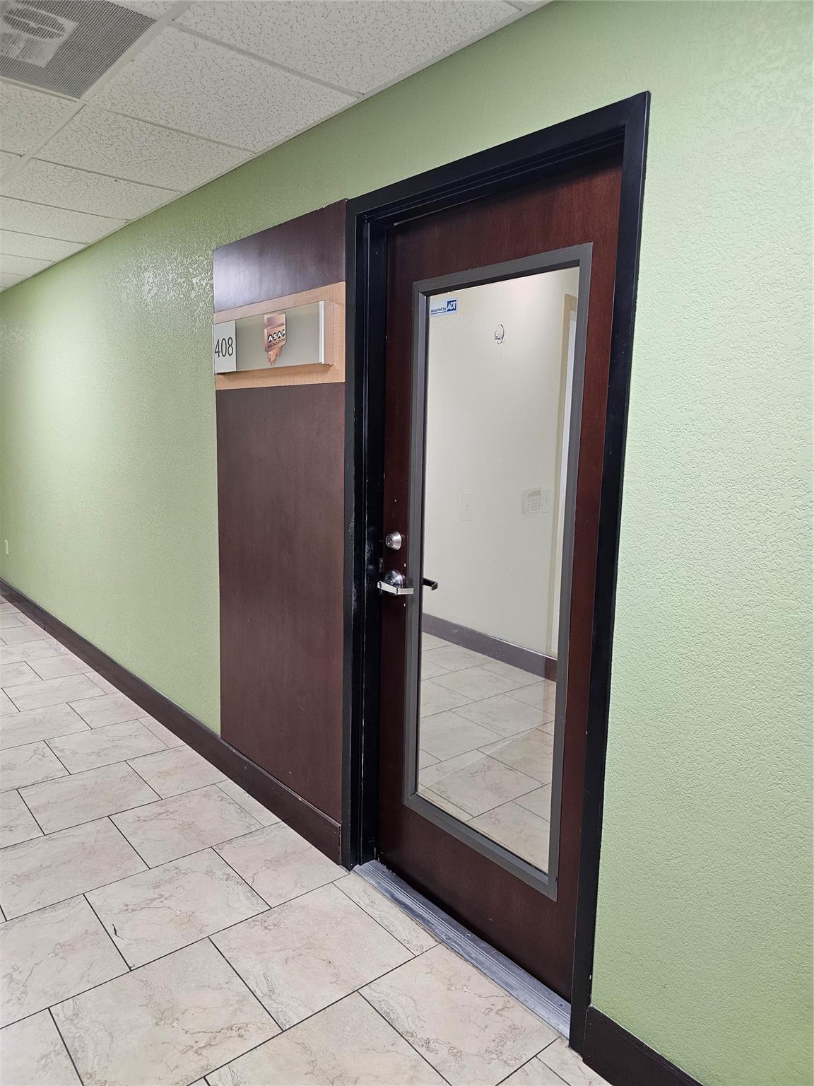Very functional and useable office in prime location. Minutes to Miami-Dade and Broward. Excellent for small business or professional office. Six (6) private offices, with one currently utilized as meeting/conference room. Small kitchenette. Storage closet. Beautiful wood plank tile floors. Nicely painted and appointed spacious layout. Covered parking available. Free surface parking. ATT and COMCAST fiber services available. Impact windows.