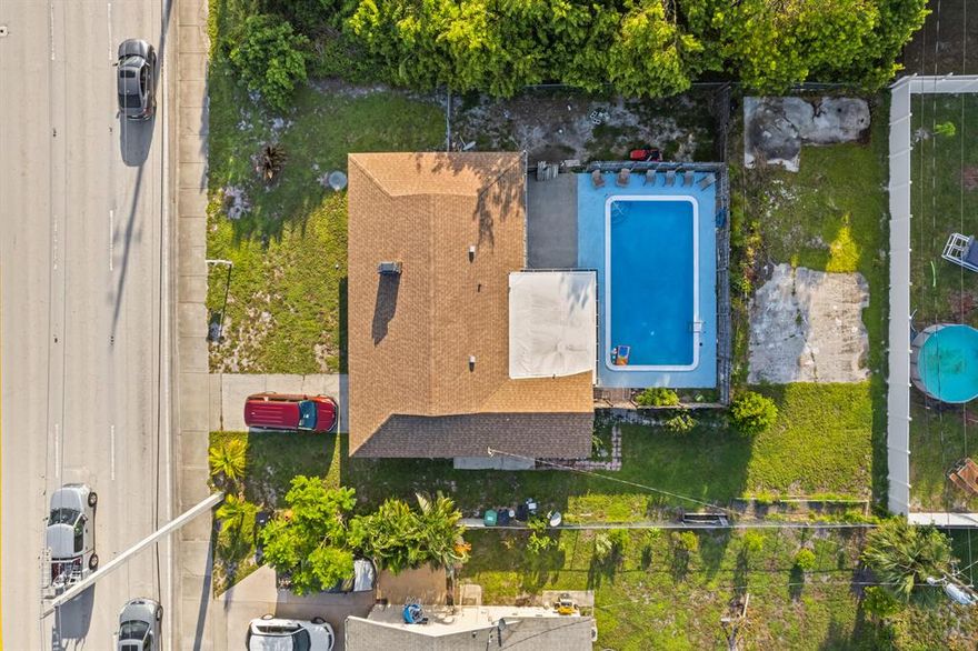 Motivated seller! Breathtaking is an understatement. This pool home sits on a spacious 10,000 square foot lot in what is considered a very central part of the city of Port St Lucie. It is located minutes away from both the I-95 and the Turnpike. Recent updates include the laminate flooring throughout the home, both of the bathrooms, the resurfacing (Diamond Brite) of the pool and the kitchen appliances, all of these things were done or replaced within the last 2 years. The A/C was replaced in 2018 and the roof was replaced in 2019. This is the perfect home for a family, an Air BnB investment or a long term rental investment. Act fast as this one will not last!